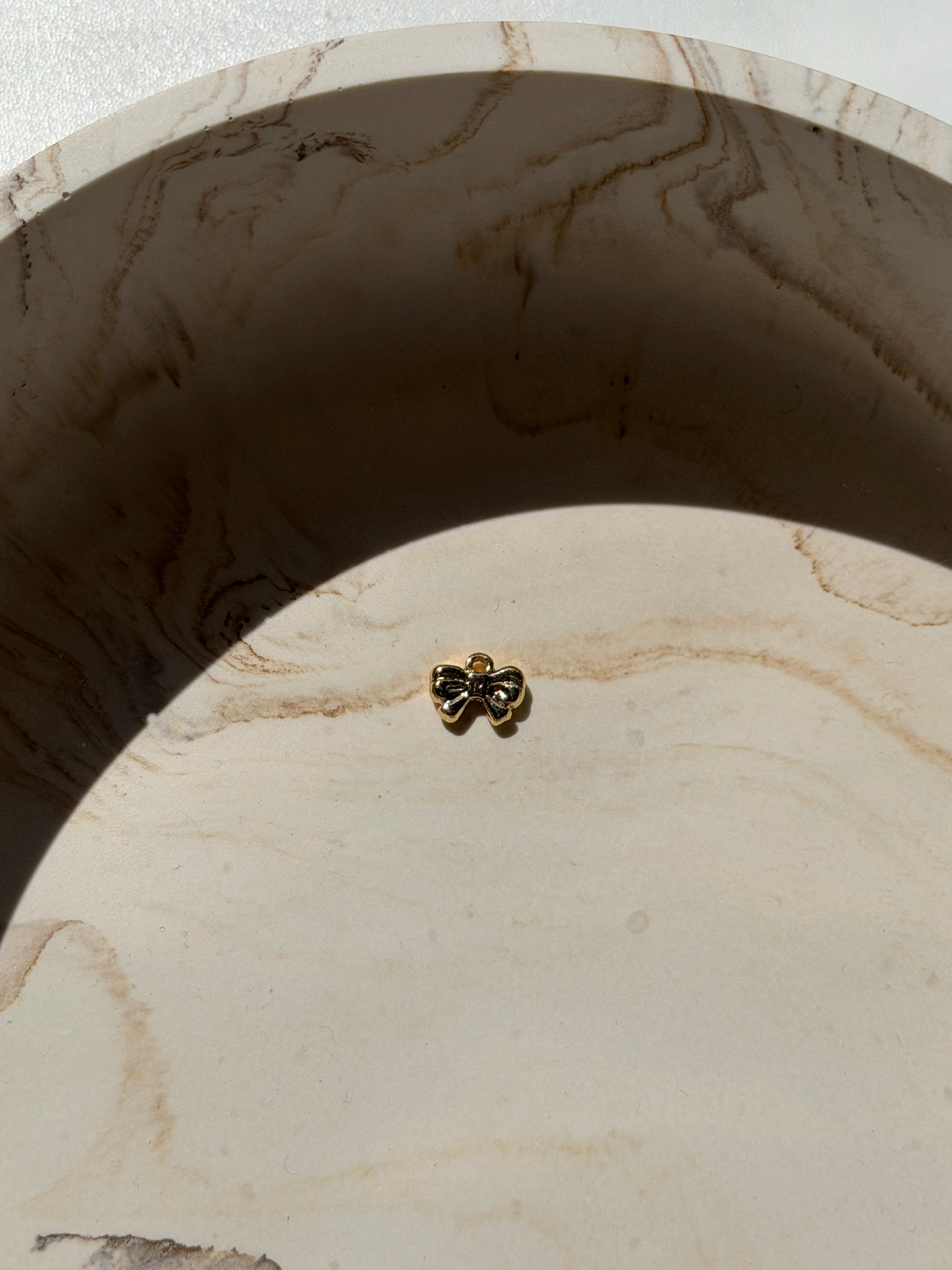 Bow charm - 24kt gold plated